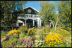 Stoweflake Mountain Resort & Spa set in pretty gardens during summertime, Vermont, USA.