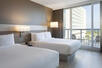 King-size bed city view with balcony, AC Hotel Miami Beach, Miami, Florida, USA