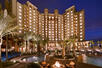 hotel exterior, night time