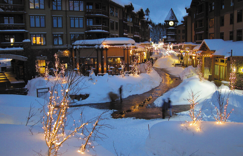 Winter evening outside Village at Mammoth condominiums, Mammoth Mountain, California, USA.