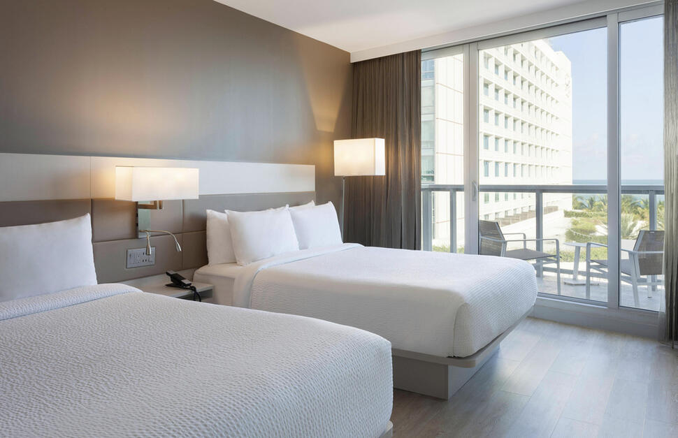 King-size bed city view with balcony, AC Hotel Miami Beach, Miami, Florida, USA