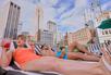 Guests lying by the pool