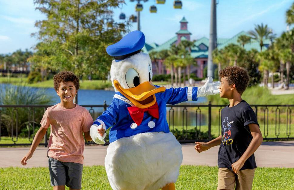 Guests with Donald Duck at Caribbean Beach Resort
