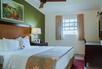 Deluxe Bedroom Partial Ocean View