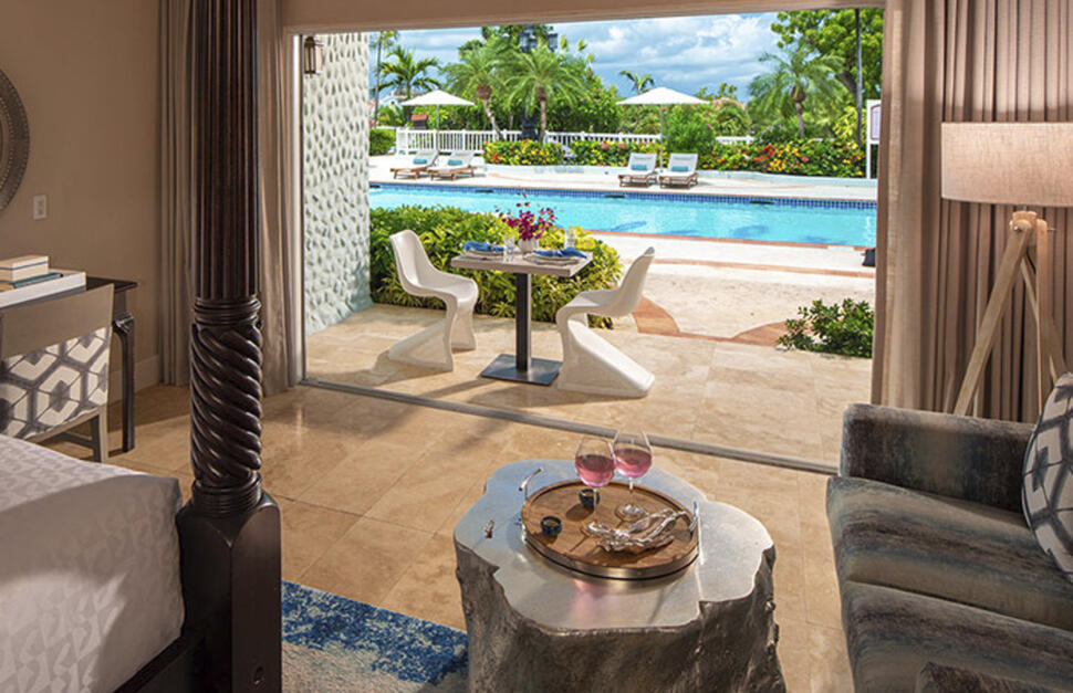 Sunset Bluff Honeymoon Luxury Poolside Walkout Club Level Room