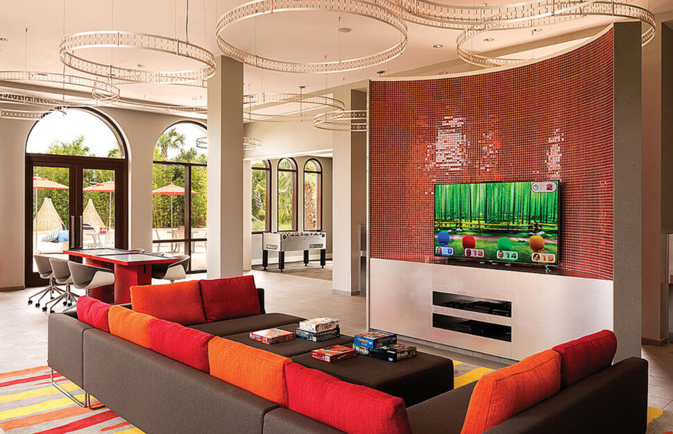 The Hideout kids' club, sofa, TV, games, Four Seasons Resort Orlando at Walt Disney World® Resort, Lake Buena Vista