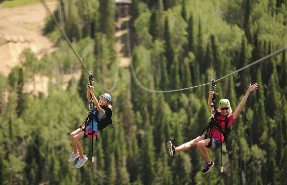 Couple zip-lining