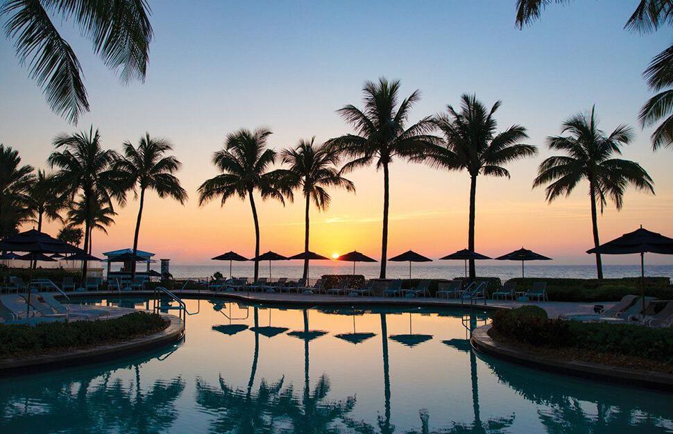 Pool and beach at sunset